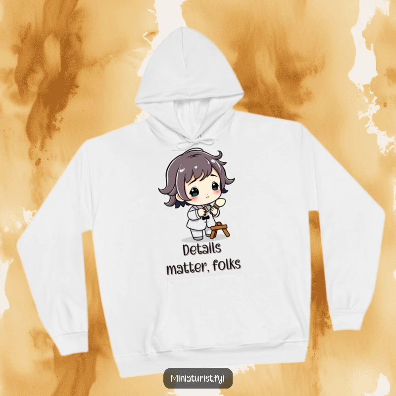 Funny Miniature Artist Hoodie with a small figure holding a tiny paintbrush, ready to add detail, perfect for artists and humor enthusiasts.